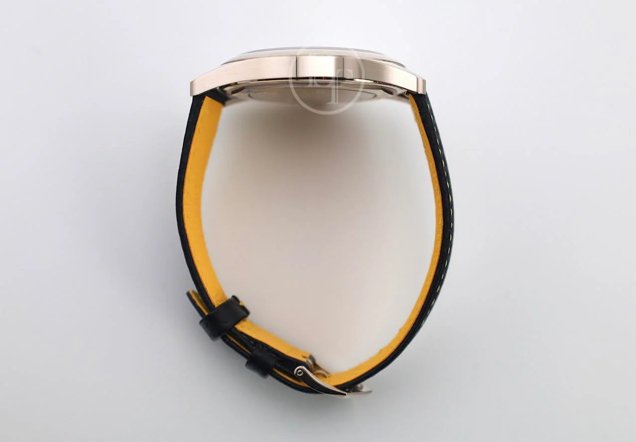 Patek Philippe Calatrava Date Sweep Seconds White Gold Black Carbon Motif Yellow Dial | 6007G-001 - Image 10