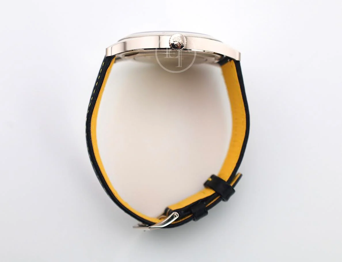 Patek Philippe Calatrava Date Sweep Seconds White Gold Black Carbon Motif Yellow Dial | 6007G-001 - Image 9